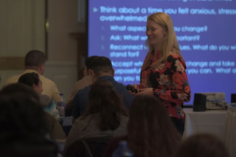 AJ Adams, master resilience trainer contractor, speaks with a student during one of the partner activities of the Master Resilience Trainer Course at RAF Mildenhall, England, Feb. 14, 2018. Student activities are vital elements of the course, and each module has multiple opportunities for the students to express their opinions. (U.S. Air Force photo by Airman 1st Class Benjamin Cooper)