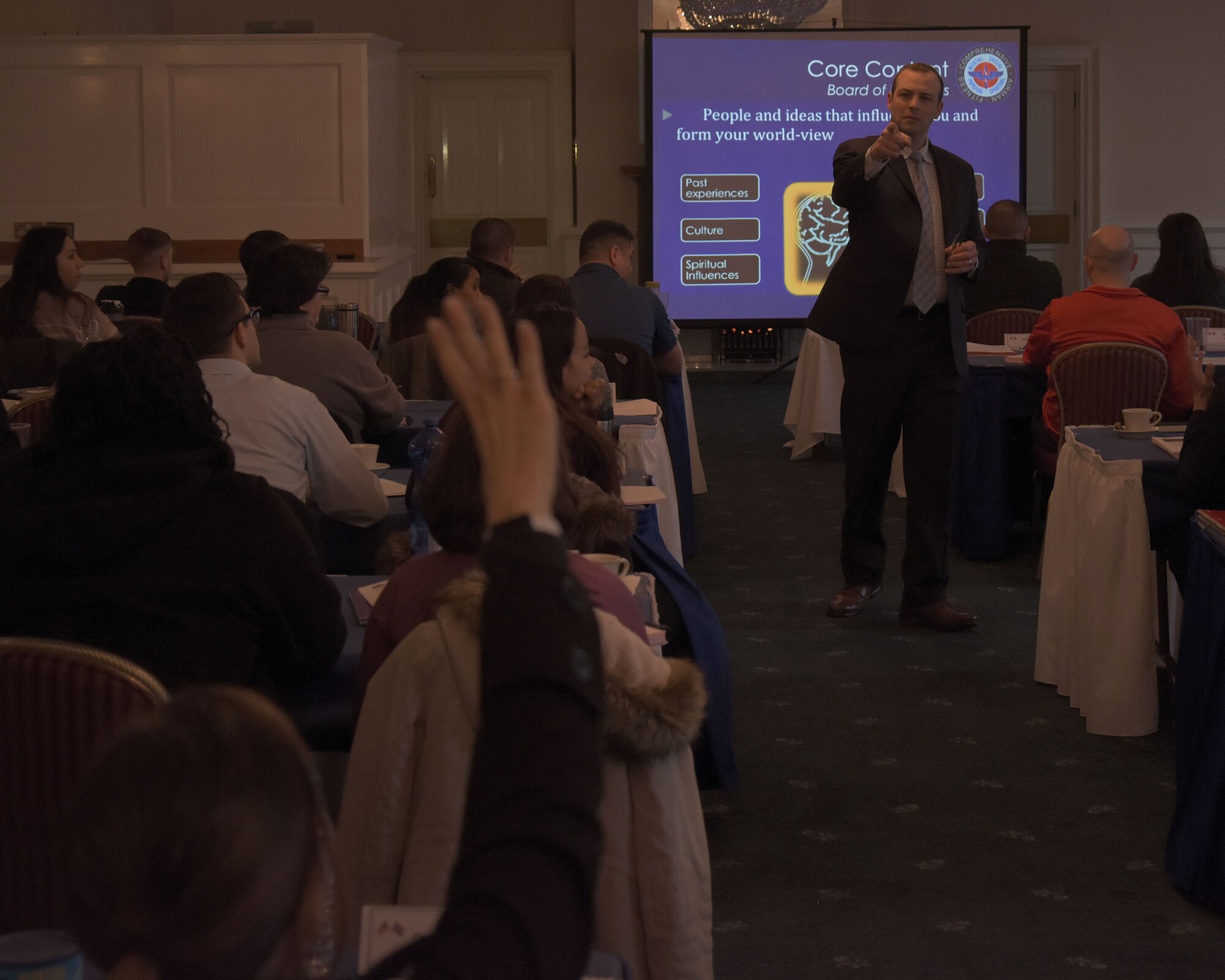Christopher Poe, master resilience trainer contractor, calls on a student during the Master Resilience Training Course at RAF Mildenhall, England, Feb. 14, 2018. The MRTC trains people to be mentally stronger and better able to tap into their strengths to handle life’s challenges. (U.S. Air Force photo by Airman 1st Class Benjamin Cooper)