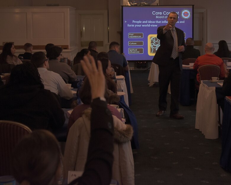 Christopher Poe, master resilience trainer contractor, calls on a student during the Master Resilience Training Course at RAF Mildenhall, England, Feb. 14, 2018. The MRTC trains people to be mentally stronger and better able to tap into their strengths to handle life’s challenges. (U.S. Air Force photo by Airman 1st Class Benjamin Cooper)