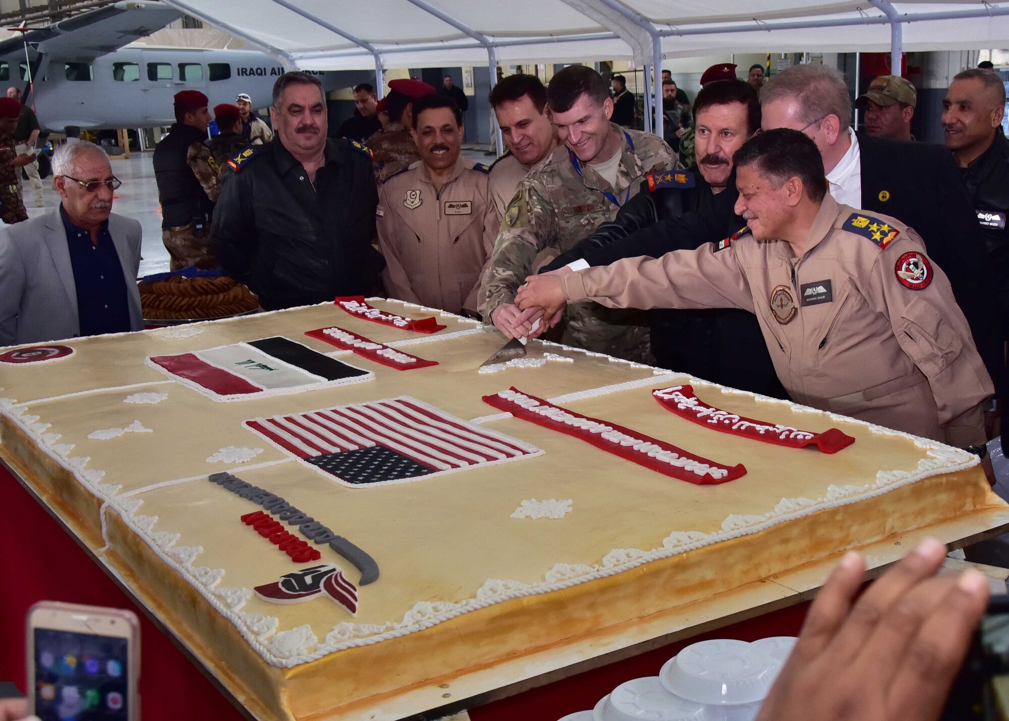 The Government of Iraq and the Coalition celebrate the reopening of the Iraqi Air Force Air Academy