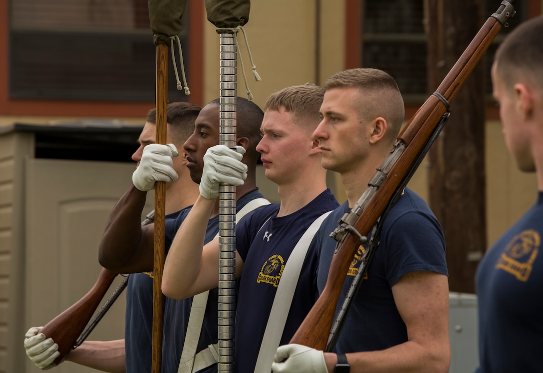 U.S. Marines with The Official Marine Corps Color Guard conduct practice at Marine Corps Air Station Yuma, Ariz., Feb. 13, 2018 to prepare for their West Coast tour. The Marine Corps Color Gaurd is apart of The Battle Color Detachment along with "The Commandants Own" U.S. Marine Corps Drum & Bugle Corps and the Marine Corps Silent Drill Platoon. (U.S. Marine Corps photo by Lance Cpl. Sabrina Candiaflores)