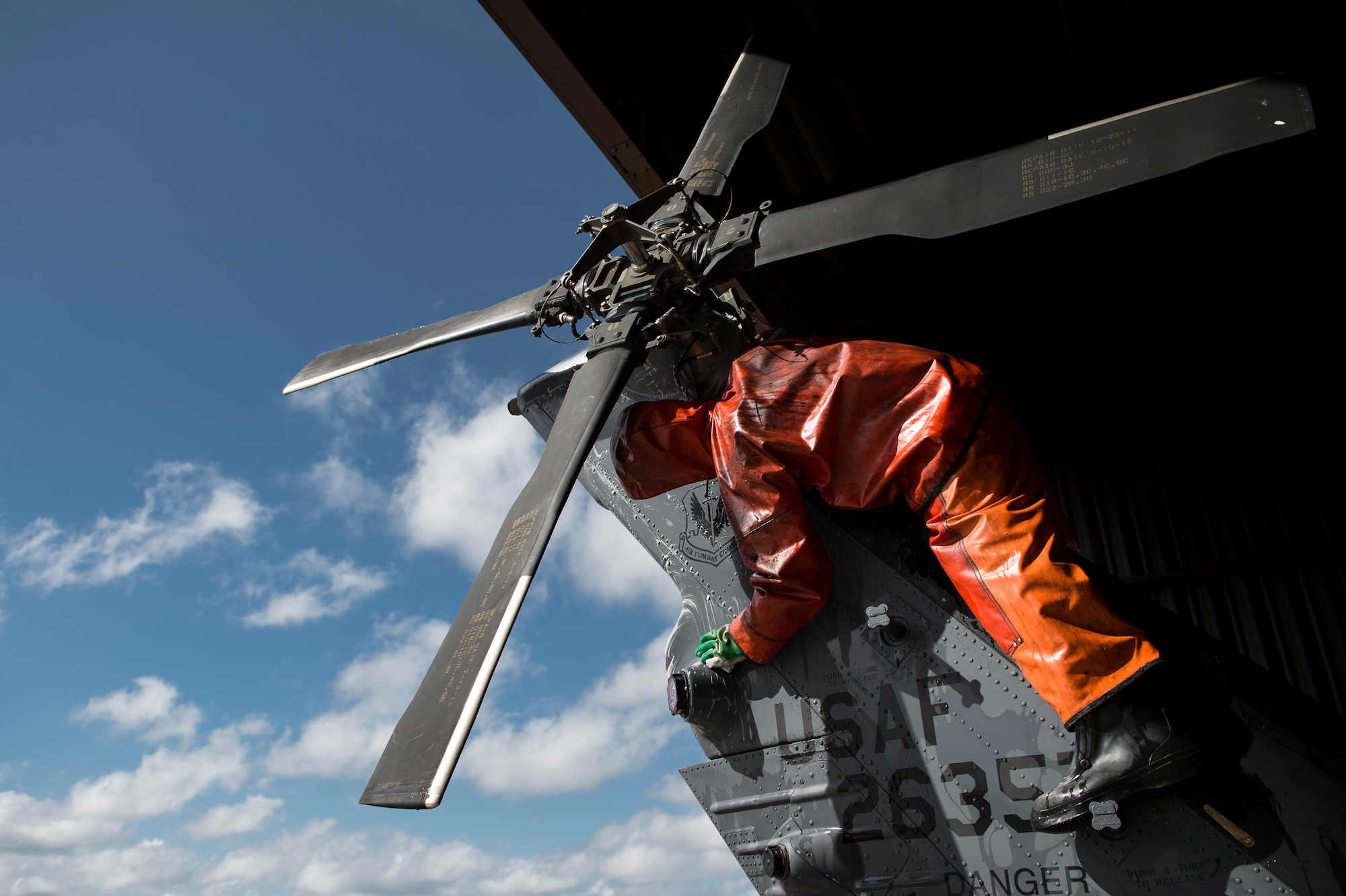 Senior Airman Bradley Simmons, 41st Helicopter Maintenance Unit crew chief, scrubs the rudder of an HH-60G Pave Hawk, Feb. 20, 2018, at Moody Air Force Base, Ga. Airmen are required to wash the helicopters every 180 days to control corrosion caused by oil, dirt and grime. Washing paired with mechanical and electrical maintenance help Airmen ensure the Pave Hawks are ready at a moment’s notice. (U.S. Air Force photo by Senior Airman Janiqua P. Robinson)
