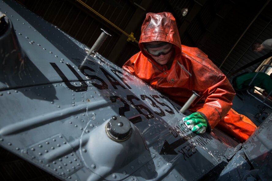 Senior Airman Bradley Simmons, 41st Helicopter Maintenance Unit crew chief, washes the rudder of an HH-60G Pave Hawk, Feb. 20, 2018, at Moody Air Force Base, Ga. Airmen are required to wash the helicopters every 180 days to control corrosion caused by oil, dirt and grime. Washing paired with mechanical and electrical maintenance help Airmen ensure the Pave Hawks are ready at a moment’s notice. (U.S. Air Force photo by Senior Airman Janiqua P. Robinson)