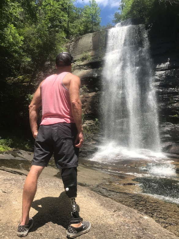Chief Master Sgt. Chad Caden, the chief enlisted manager with the 633rd Civil Engineer Squadron at Joint Base Langley-Eustis, was able to go hiking in South Carolina in July 2017, nearly 7 months after receiving an amputation on his right leg. After years of pain, Caden was diagnosed with Osteonecrosis in his right foot, which caused a loss of blood flow to his foot and resulting in bone decay. Caden received his amputation on Dec. 27, 2016 to get rid of the pain, minimize the chance of the bone disease spreading, and increase his chance of returning to an active lifestyle. (Courtesy photo)