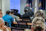 DLA Land and Maritime Deputy Commander Steven Alsup speaks at the Feb. 13 Land and Maritime Academy. The Academy sought to improve productivity through presentations on workforce culture, organizational structure and interoffice education.