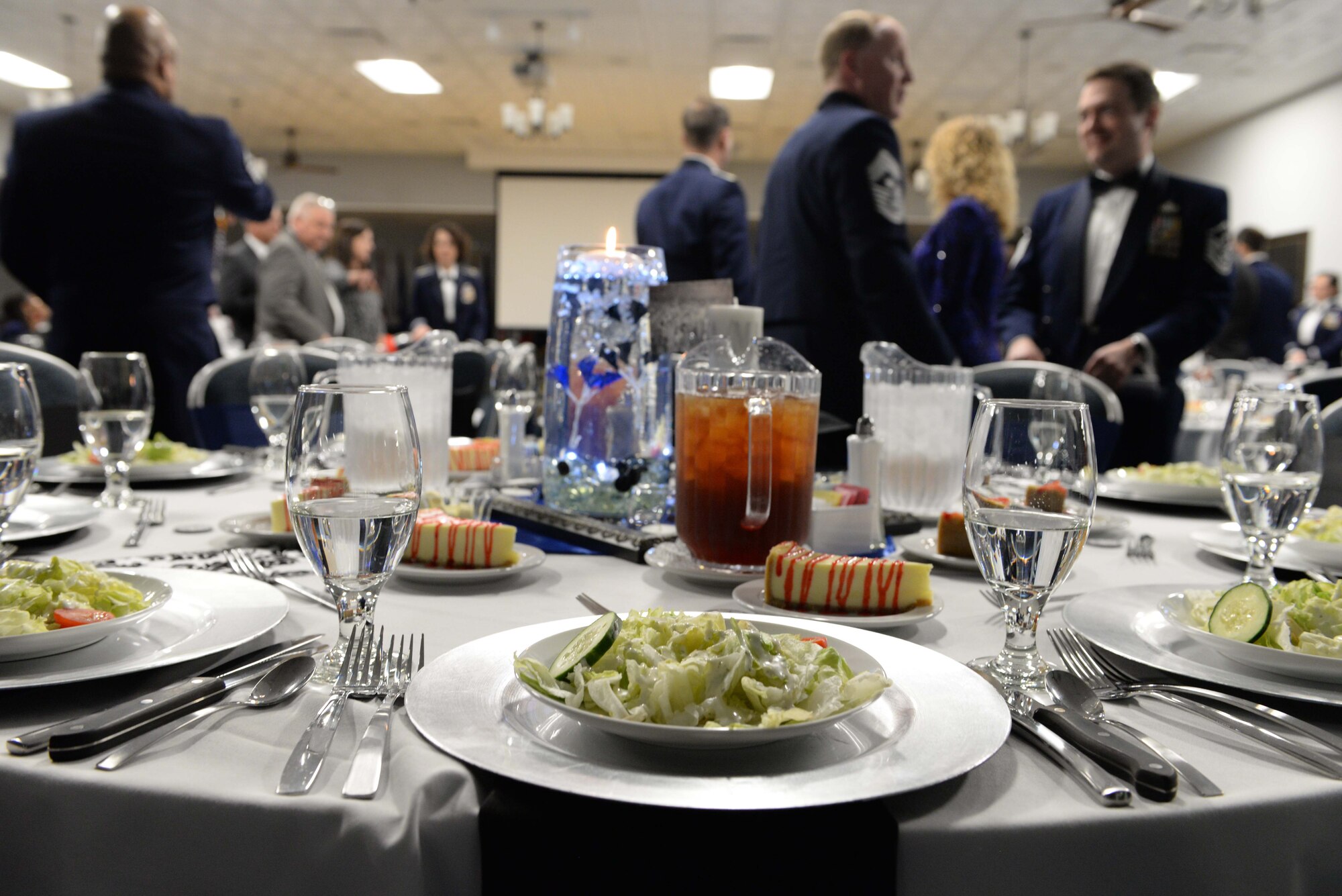 Team BLAZE members greet each other before the 2017 Annual Awards Banquet Feb. 9, 2018, on Columbus Air Force Base, Mississippi. Fifty-five Team BLAZE members and two flights competed in 20 categories for wing level awards. The banquet recognized multiple 19th Air Force level awards during the award presentations. (U.S. Air Force photo by Airman 1st Class Keith Holcomb)