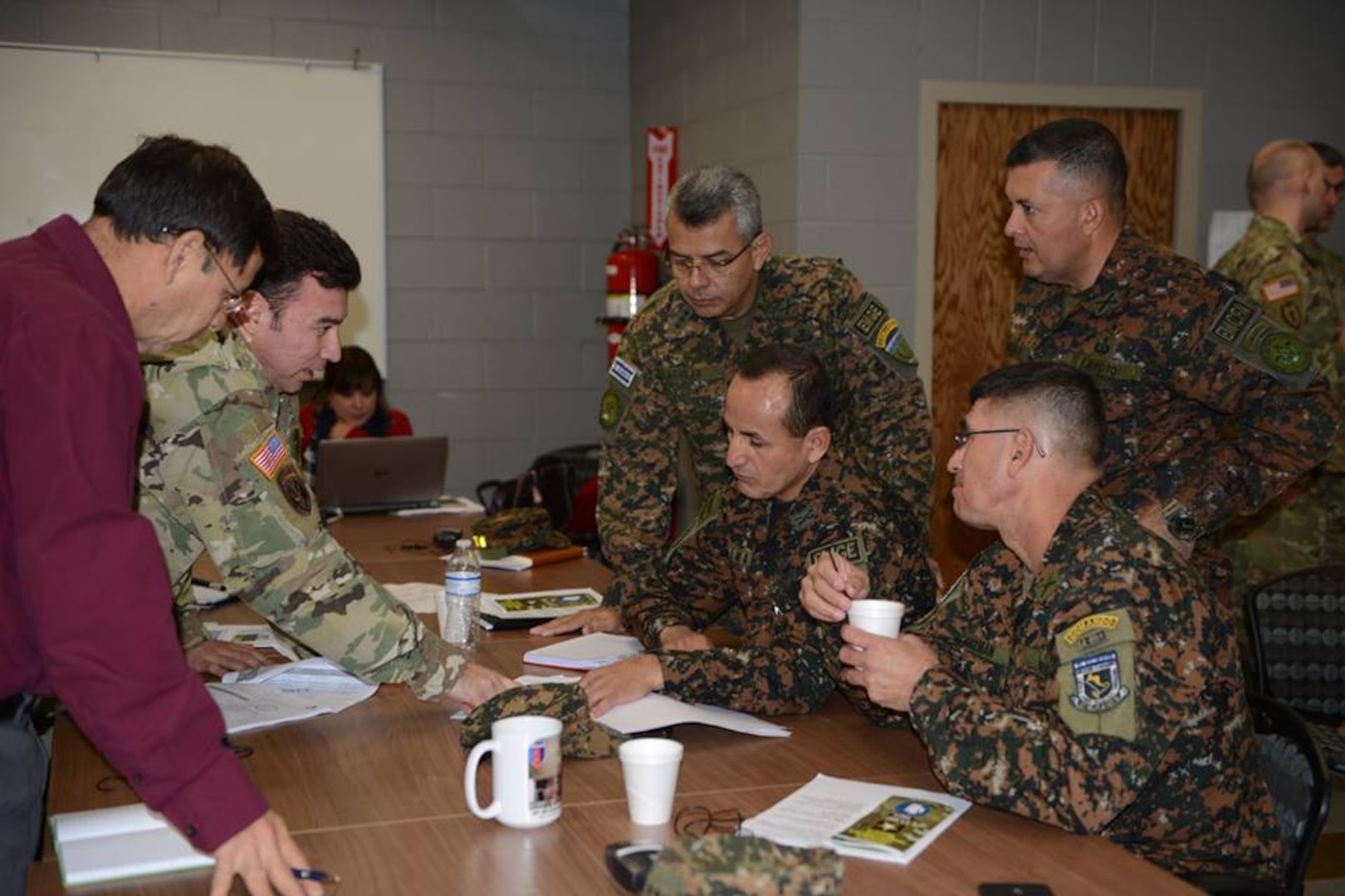 Soldiers from the Salvadoran Army participate in a break out session with representatives from U.S. Army South during day two of staff talks steering committee meetings Feb. 14.