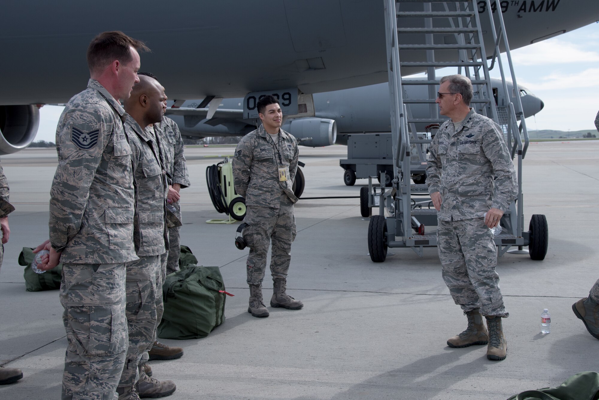 Maj. Gen. Randall Ogden and Chief Master Sgt. Timothy White, the Fourth Air Force commander and command chief, 
visited the units of the 349th AMW, where they recognized star performers and observed airmen completing readiness training.