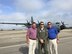 PGA tour champion players Glen Day and Brandt Jobe pose for a photo with Maj. Jeffrey Mitchell, 53rd Weather Reconnaissance Squadron navigator, Feb. 21, 2018 at Keesler Air Force Base, Mississippi. The golfers visited the 403rd Wing to learn more about its mission and capabilities and toured a WC-130J Super Hercules aircraft. (U.S. Air Force photo by Staff Sgt. Heather Heiney)