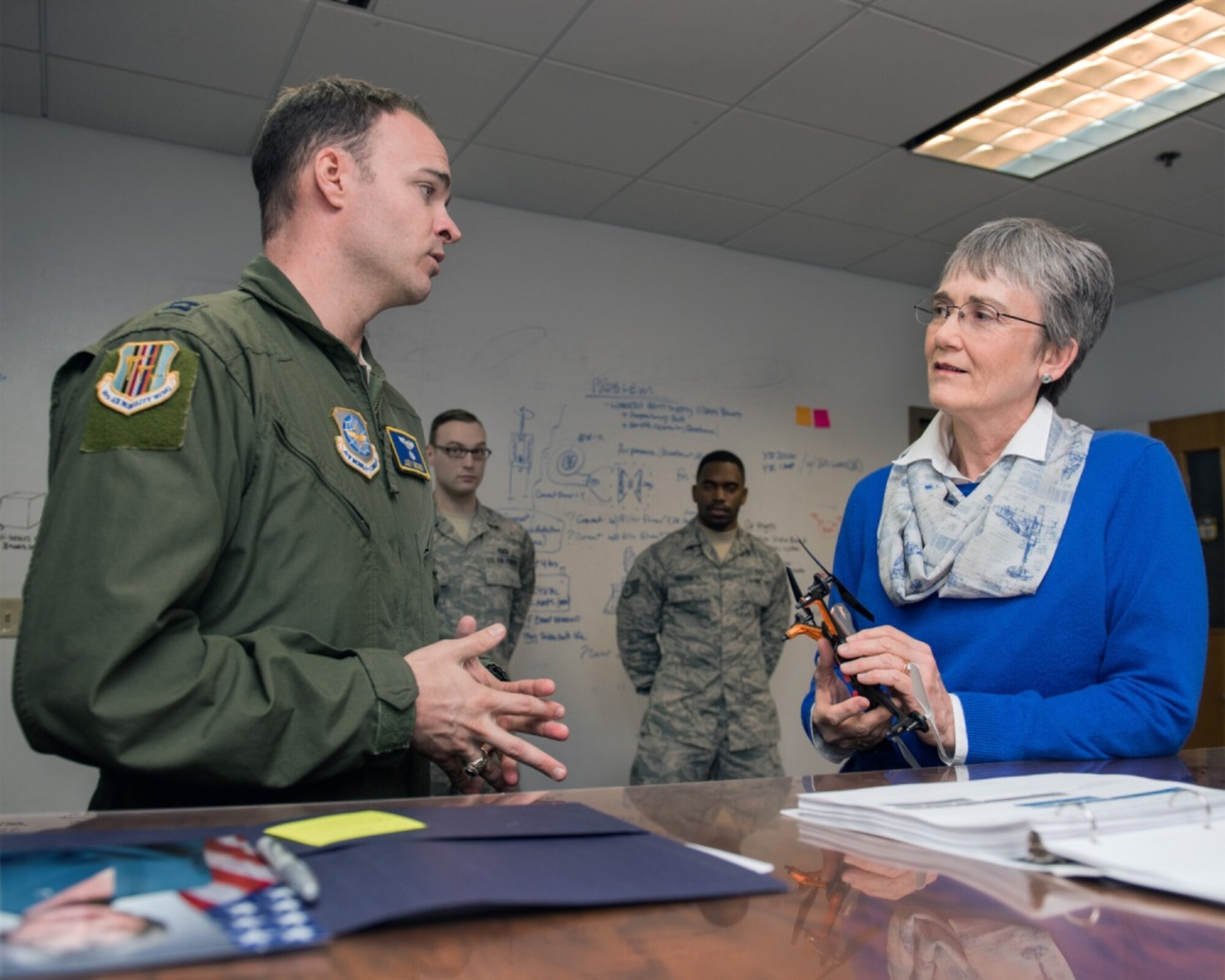 Secretary of the Air Force Heather Wilson speaks with U.S. Air Force Capt. Joey Brewer, 60th Air Mobility Wing during a stop at Travis Air Force Base, Calif., Jan. 23, 2018. Wilson toured the Phoenix Spark office during her stop. Phoenix Spark is a program chartered by U.S. Air Force Gen. Carlton D. Everhart II, Air Mobility Command commander to provide AMC Airmen at all levels avenues to be innovative in finding ways to modernizing the Air Force. (U.S. Air Force photo by Louis Briscese)