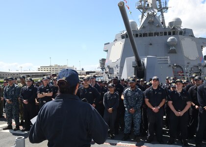 Arleigh Burke-class guided-missile destroyer USS Sterett (DDG 104) Commanding Officer Cmdr. Claudine Caluori addresses the crew during an all-hands call. Sterett is on a scheduled deployment to conduct operations in the Indo-Pacific region. It will also support the Wasp Expeditionary Strike Group (ESG) in order to advance U.S. Pacific Fleet’s Up-Gunned ESG concept and will train with forward-deployed amphibious ships across all mission areas.