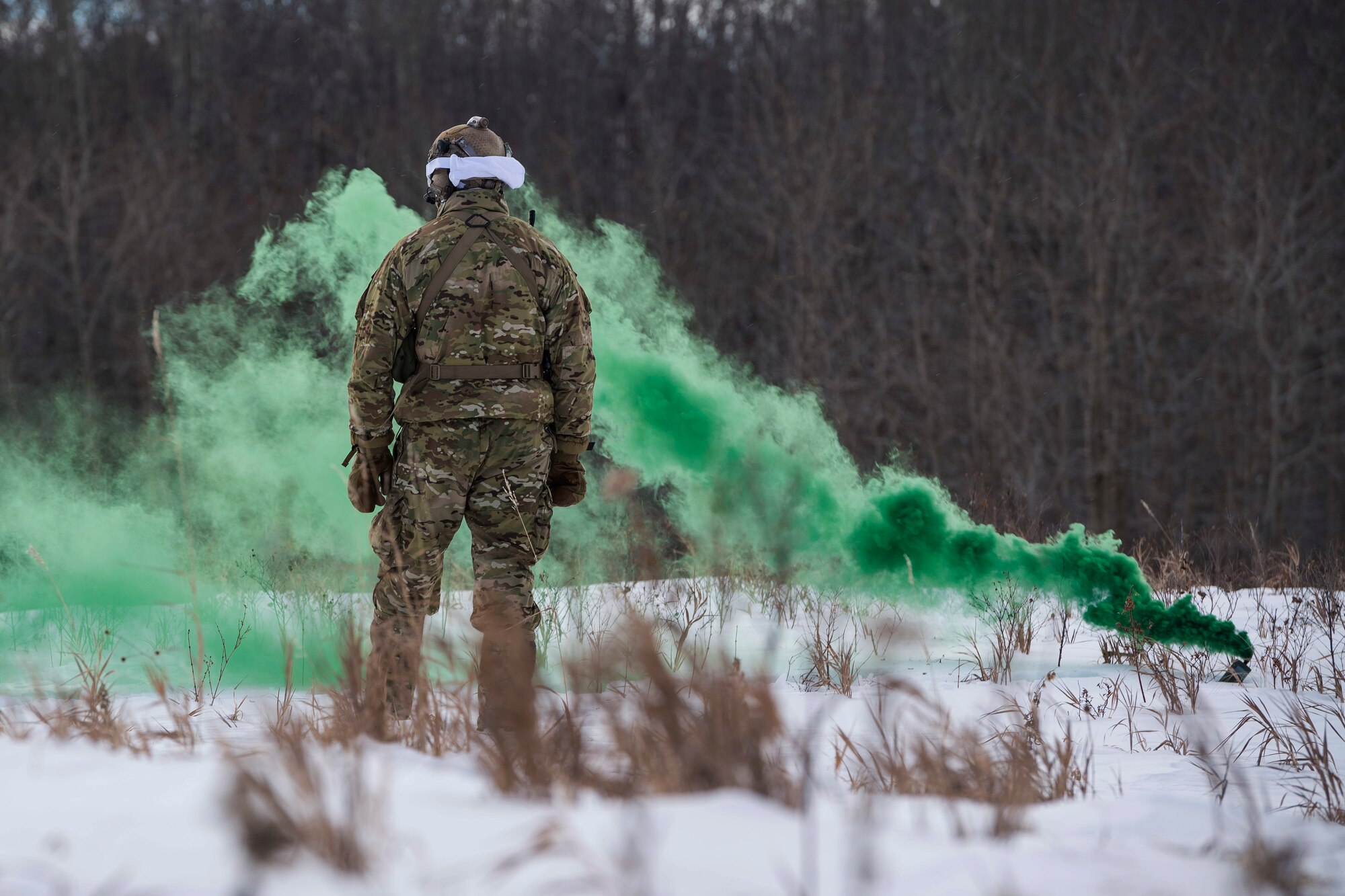 Defenders from the 91st Security Forces Group, Minot Air Force Base, North Dakota, participated in a three-day field training exercise in the Turtle Mountain State Forest, North Dakota, Feb. 12-14, 2018. During the training, 91st SFG Airmen learned survival techniques including; how to build shelters and fires, set snares, navigate to a landing zone and vector rescue helicopters. (U.S. Air Force photo by Senior Airman J.T. Armstrong)