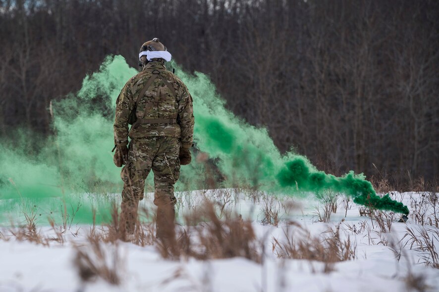 Defenders from the 91st Security Forces Group, Minot Air Force Base, North Dakota, participated in a three-day field training exercise in the Turtle Mountain State Forest, North Dakota, Feb. 12-14, 2018. During the training, 91st SFG Airmen learned survival techniques including; how to build shelters and fires, set snares, navigate to a landing zone and vector rescue helicopters. (U.S. Air Force photo by Senior Airman J.T. Armstrong)