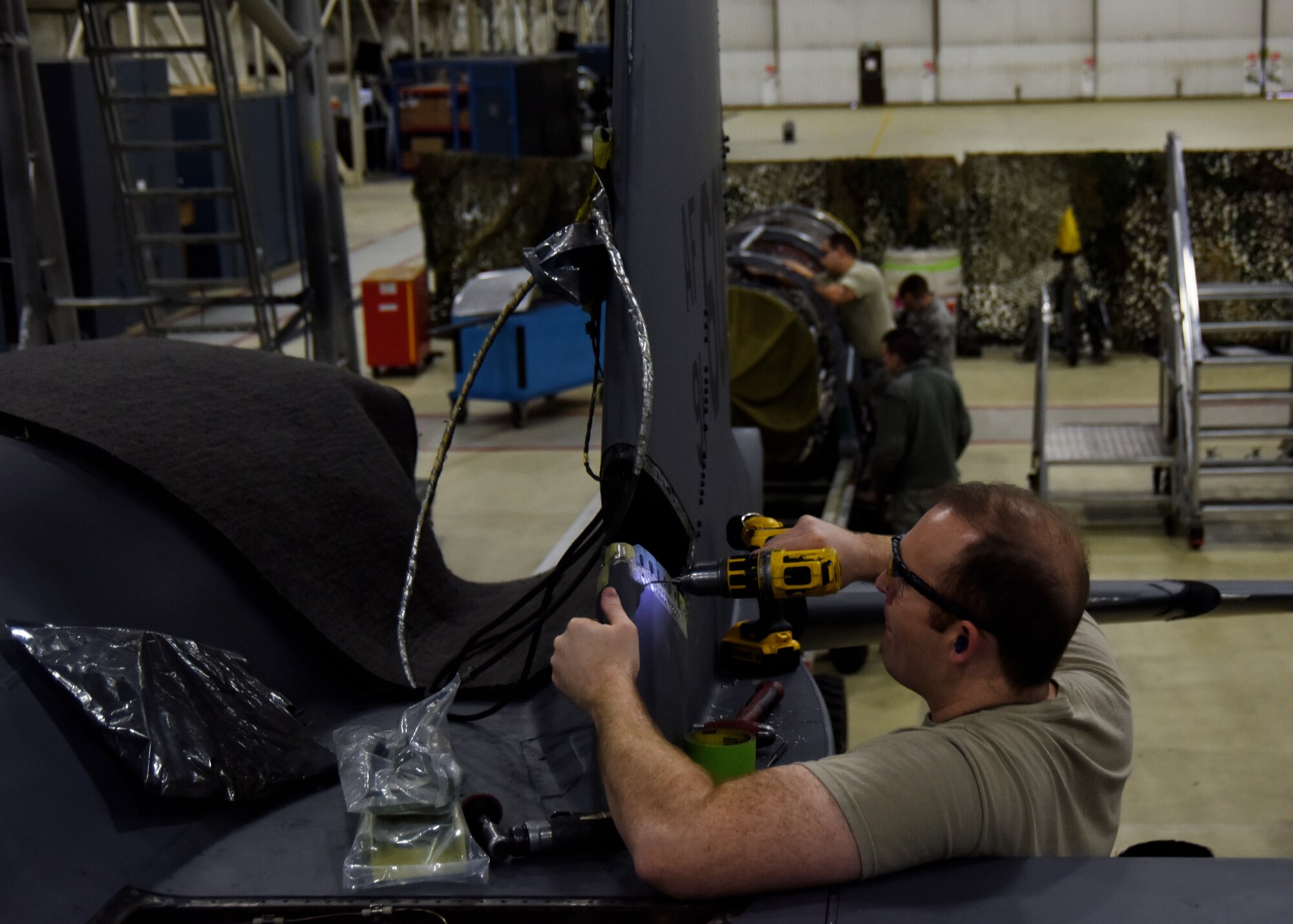 Staff Sgt. Eric Pate, 48th Equipment Maintenance Squadron aircraft structural maintenance craftsman, repairs a bracket on an F-15E Strike Eagle at Royal Air Force Lakenheath, England, Feb. 14. During a phase inspection, crew chiefs assigned to EMS inspect and repair Liberty Wing aircraft. (U.S. Air Force photo/Senior Airman Abby L. Finkel)