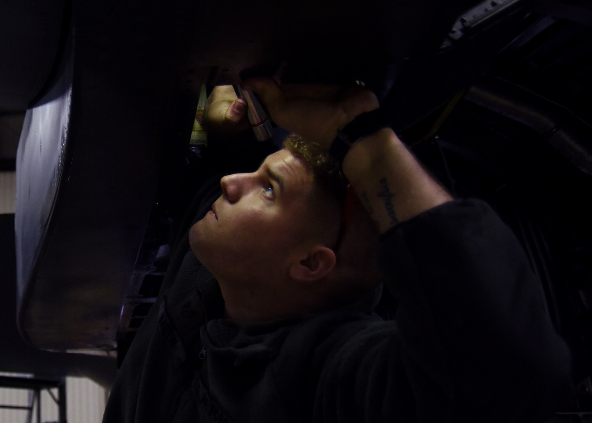 Staff Sgt. Christopher Marin, 48th Equipment Maintenance Squadron inspection section technician, inspects a stab actuator at Royal Air Force Lakenheath, England, Feb. 14. Each F-15 is inspected every 400 flying hours. (U.S. Air Force photo/Senior Airman Abby L. Finkel)