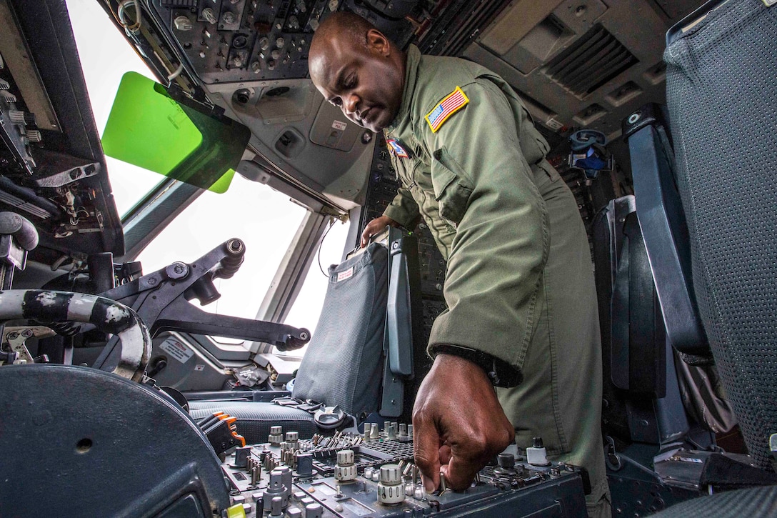 Air Force Master Sgt. Greg L. Thomas powers up the KC-10 Extender aircraft.