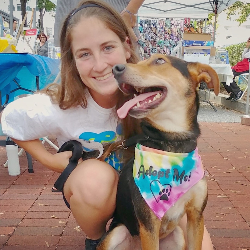 Cpl. Kayla Soles volunteering for the Operation Paws for Homes. Soles says she started volunteering to help animals and that she expanded her mission to include helping the elderly, school children and others.