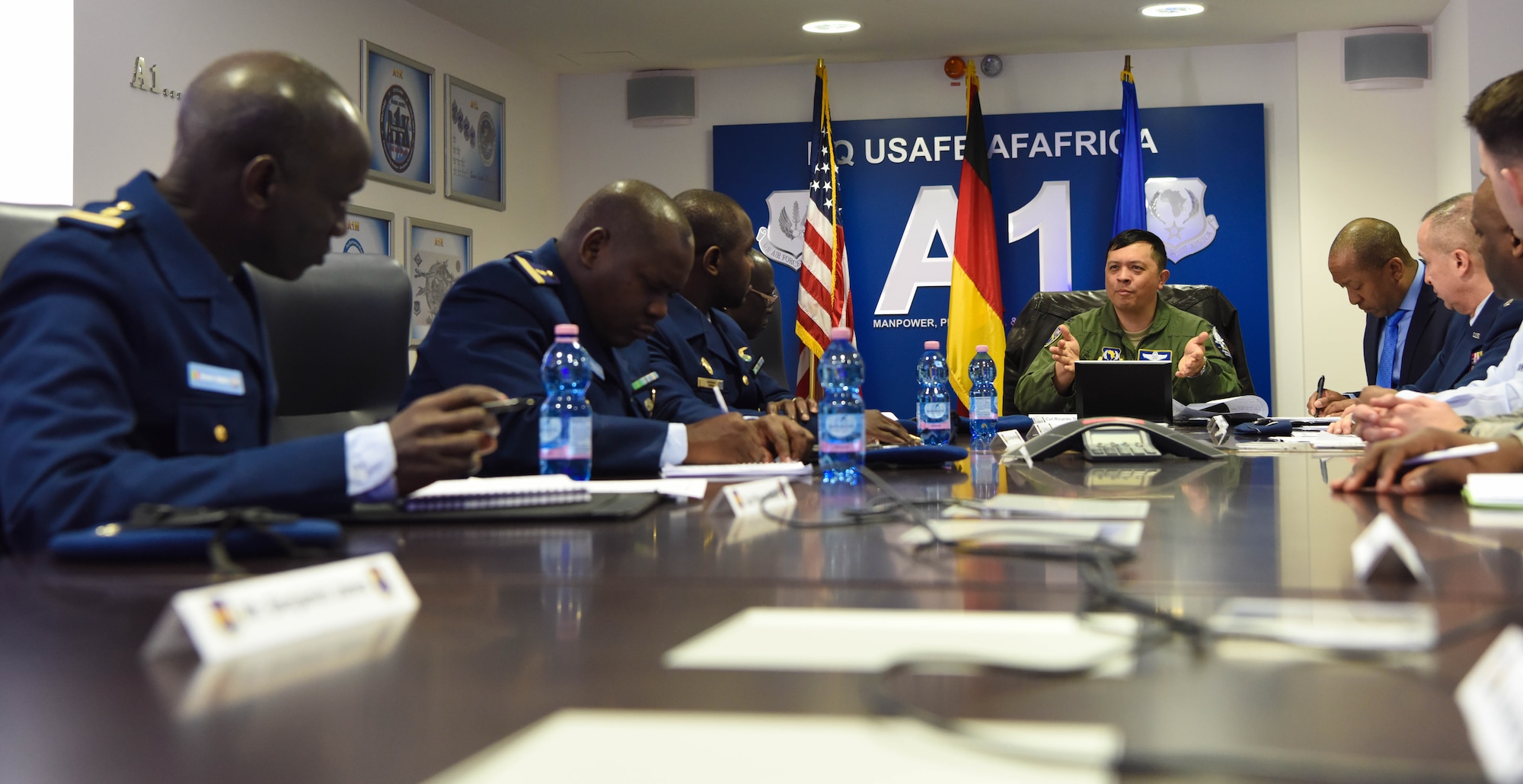 U.S. Air Force Col. Ric Trimillos, U.S. Air Forces in Europe and Africa International Affairs Division chief, speaks to representatives with the Senegal Air Force about aircraft maintenance at USAFE Headquarters, on Ramstein Air Base, Germany, Feb. 16, 2018. The representatives visited USAFE - HQ was to facilitate discussions on force development, force sustainment, retention, growth management, aircraft maintenance, and logistics.