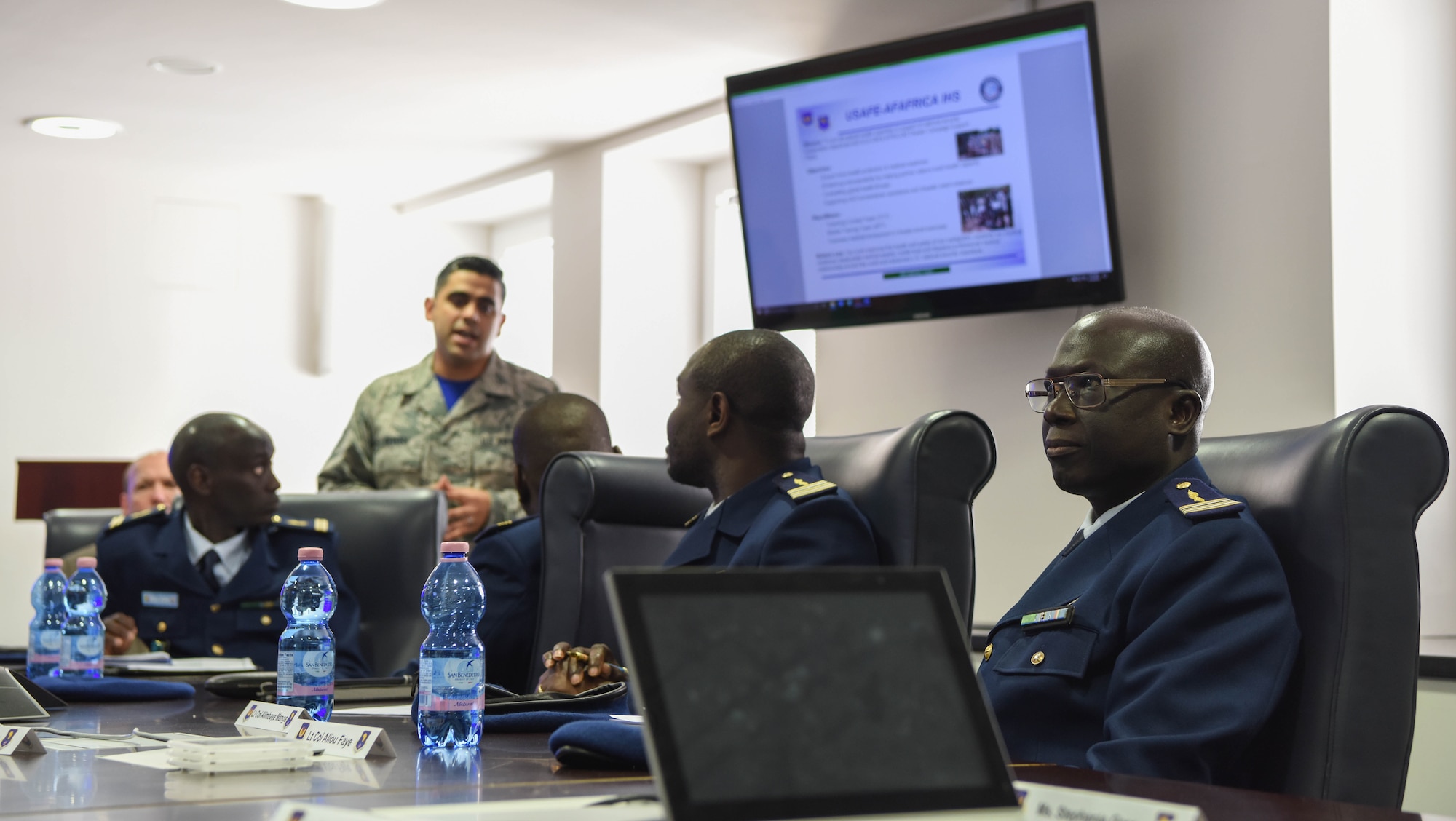 U.S. Air Force Staff Sgt. Jose Devora, U.S. Air Forces in Europe international health specialist, gives a presentation to the representatives of the Senegal Air Force at USAFE Headquarters on Ramstein Air Base, Germany, Feb. 16, 2018. The main focus of this presentation was to emphasize on building relationships in international communities.