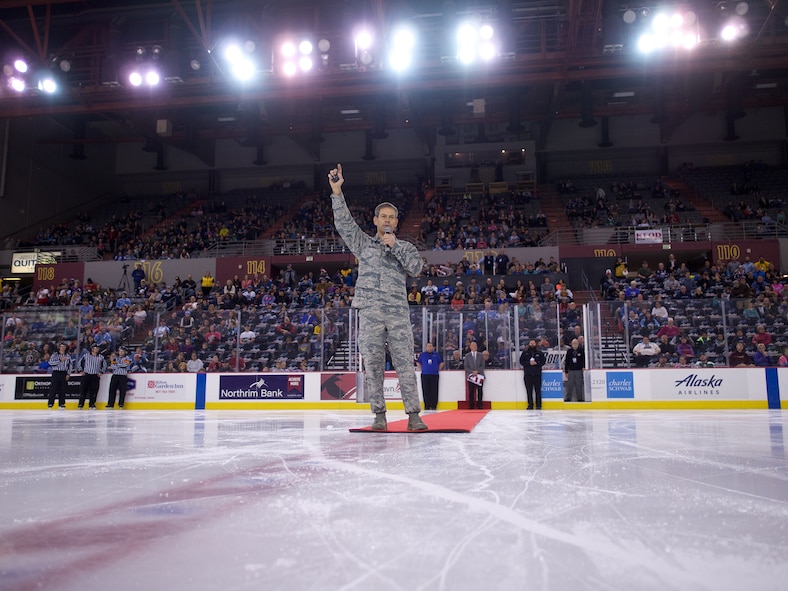 Air Force Lt. Gen. Kenneth Wilsbach, Alaskan Command commander, greets the crowd before ceremonially dropping the puck, Nov. 12, 2016, at the Sullivan Arena in Anchorage, Alaska. The Alaska Aces ECHL hockey team hosted the Indianapolis Fuel during military appreciation games Nov. 9, 11 and 12 at the Sullivan Arena. (U.S. Army National Guard photo by Sgt. David Bedard)