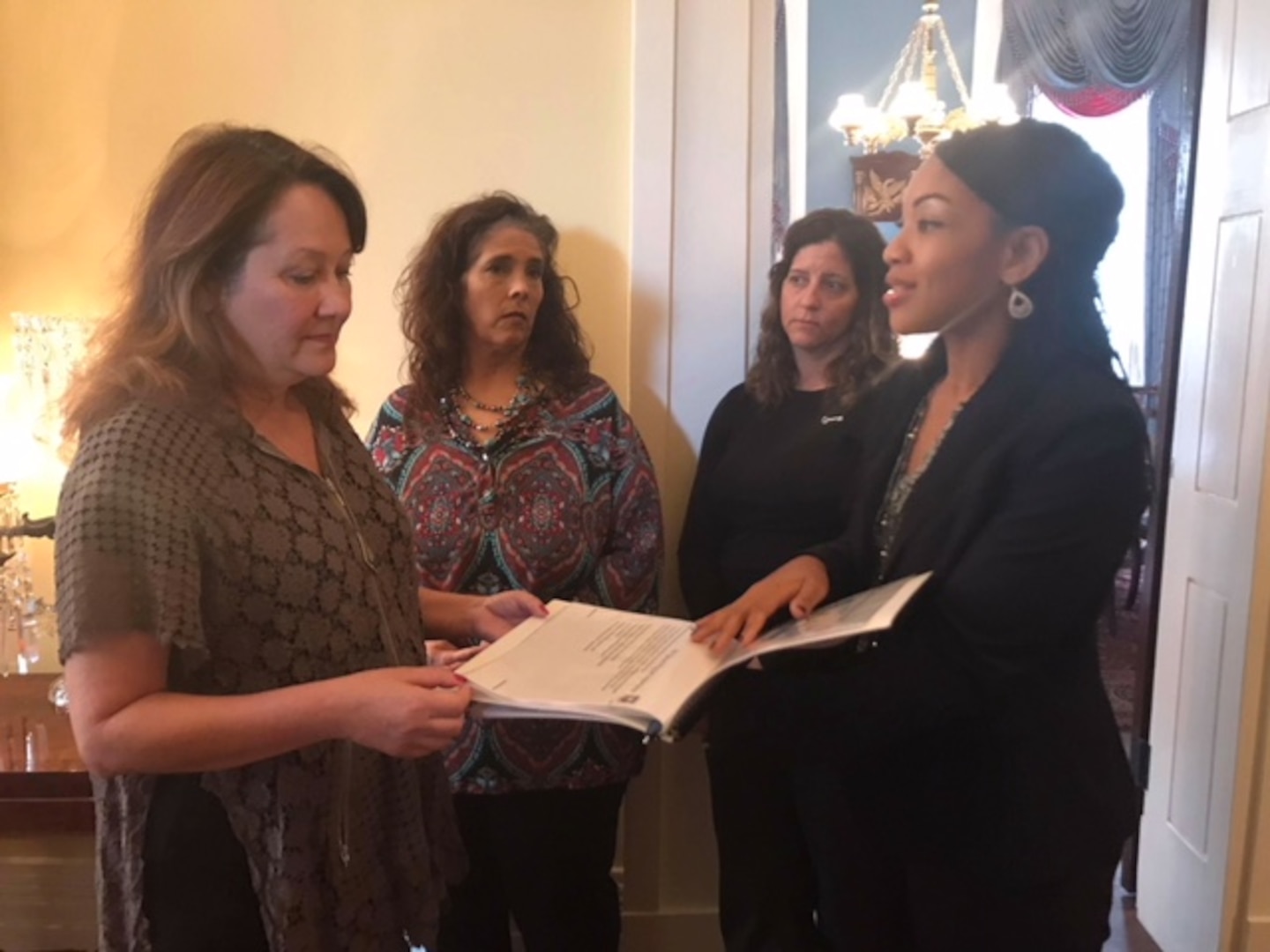 Volunteers from the Key Spouse Program, a program that assists Air Force families within the Joint Base San Antonio community, went to Austin, Texas this past January and met with Texas First Lady Cecilia Abbott (left) as they highlighted the program’s success.