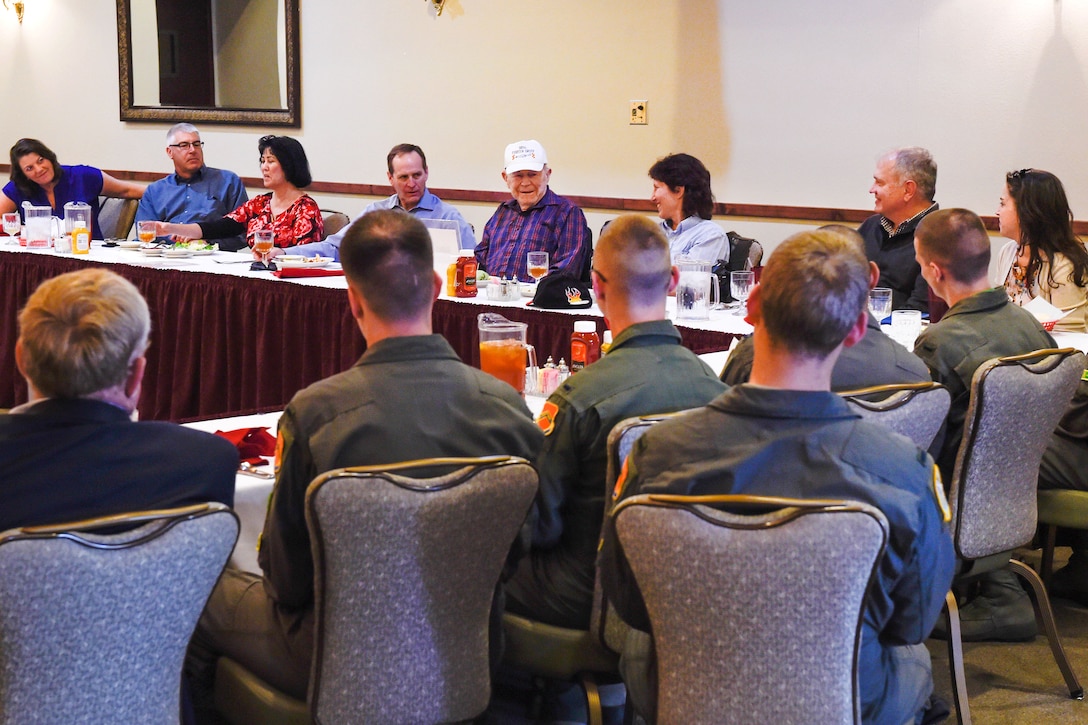 Retired Air Force Brig. Gen. Chuck Yeager, center, spends time with team Luke Thunderbolts.