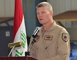 Brig. Gen. Andrew Croft, director of the Coalition Aviation Advisory and Training Team, speaks Feb. 21, 2018, during the Iraqi Air Force Academy opening ceremony at Balad Air Base, Iraq. (U.S. Air Force photo by Tech. Sgt. Louis Vega Jr.)