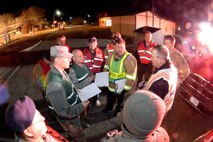 Assistant Chief Michael King, incident commander, briefs key individuals during an emergency response exercise Jan. 30, 2018, at Hill Air Force Base, Utah. (U.S. Air Force photo by Todd Cromar)
