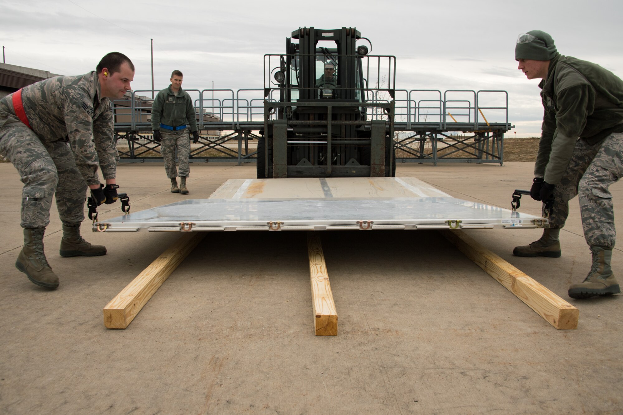 Airmen from the 649th Munitions Squadron prepare pallets during a readiness exercise Jan. 30, 2018, at Hill Air Force Base, Utah. (U.S. Air Force photo by R. Nial Bradshaw)