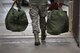 Airmen load mobility bags during a readiness exercise Jan. 29, 2018, at Hill Air Force Base, Utah. Airmen simulated the process of filling their mobility bags, weapon issue, and going through a pre-deployment function line. (U.S. Air Force photo by Cynthia Griggs)