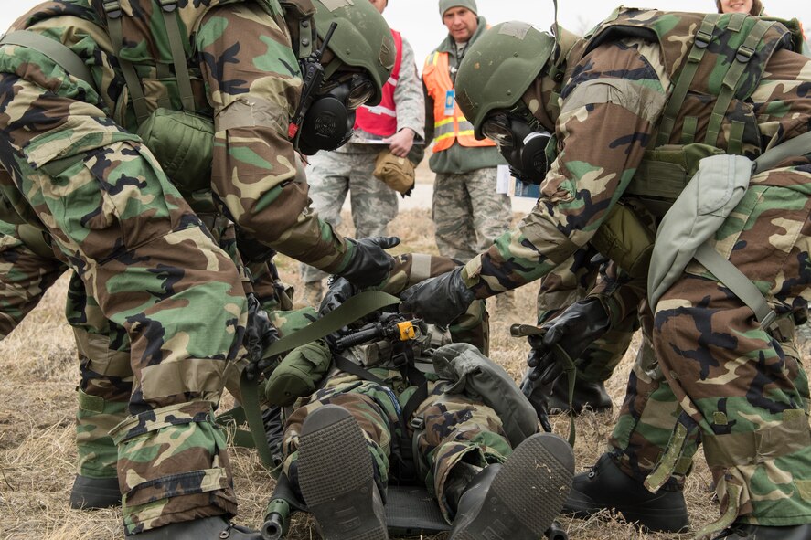 Airmen transport a simulated casualty on a litter during a readiness exercise Feb. 2, 2018, at Hill Air Force Base, Utah. (U.S. Air Force photo by R. Nial Bradshaw)