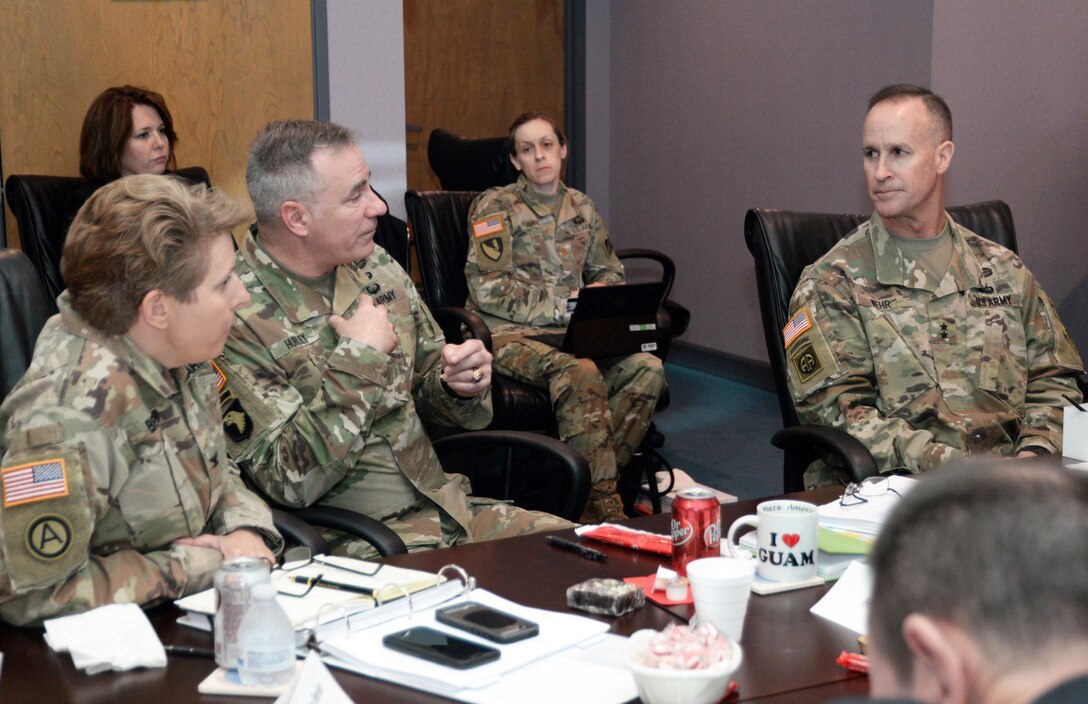 Maj. Gen. Michael Wehr, deputy commanding general U.S. Army Corps of Engineers, right, and Col. Christine Beeler, left, listen as Col. John Hurley, U.S. Army Engineering and Support Center, Huntsville commander discusses actions presented during the Center's command strategic review Feb. 13-14.