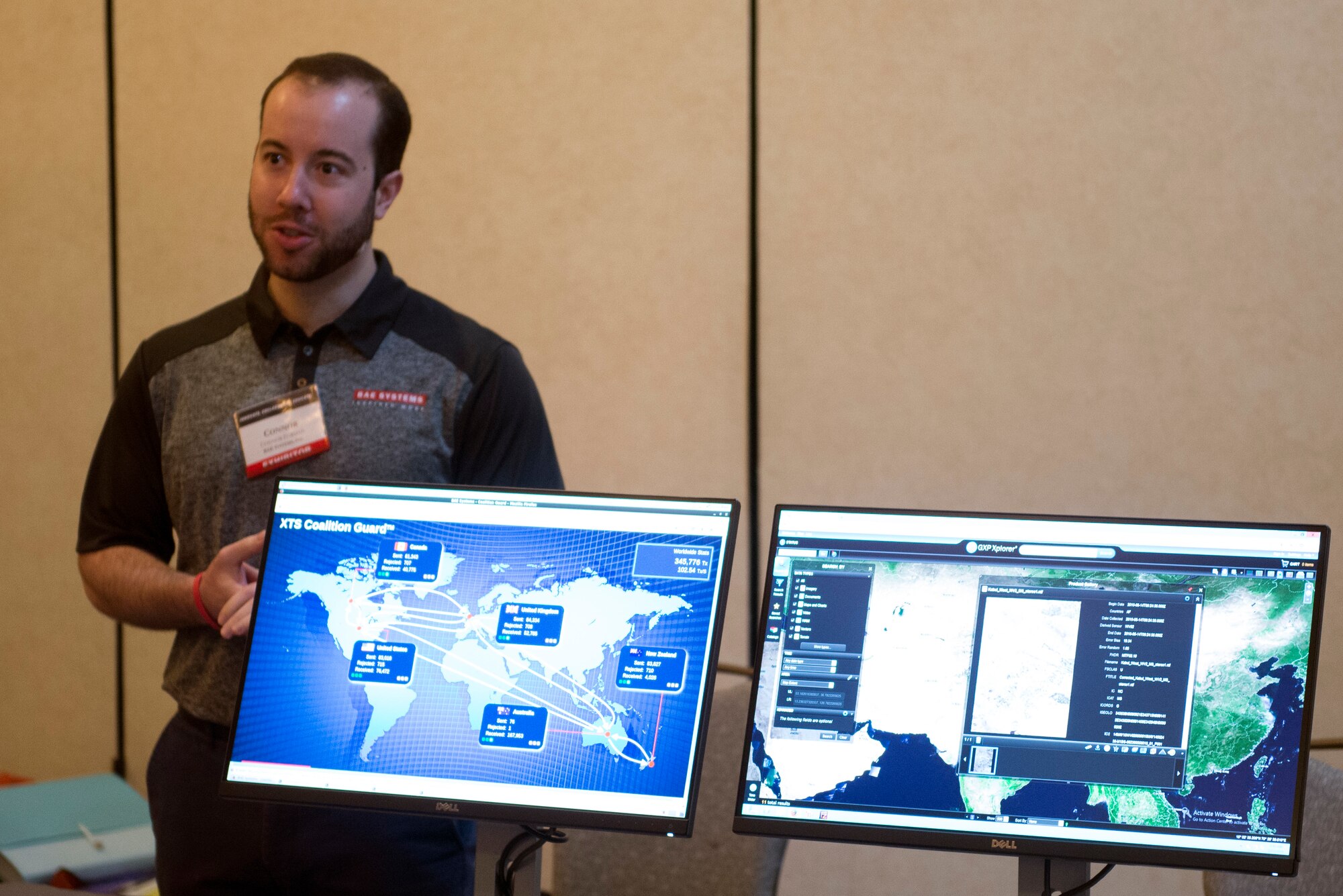 A technology company representative demonstrates network management solutions during the 2018 Luke Tech Expo at Luke Air Force Base, Ariz., Feb. 22, 2018. The tech expo invited all interested Luke Airmen to get a glimpse at new advances and future technology solutions. (U.S. Air Force photo/Senior Airman Ridge Shan)