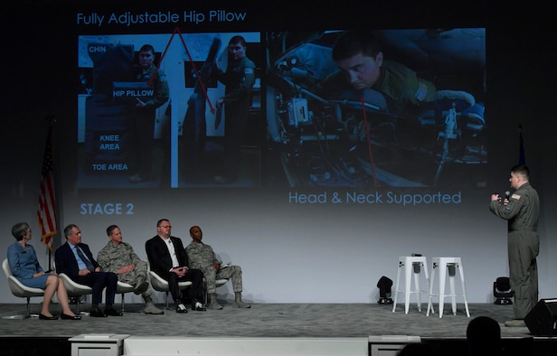 Master Sgt. Bartek Bachleda (right), 22nd Air Refueling Wing aircraft boom operator, from McConnell Air Force Base, Kansas, briefs his idea to the Spark Tank panel during the Air Force Association Air Warfare Symposium, Orlando, Fla., Feb. 22, 2018. (U.S. Air Force photo by Wayne A. Clark)