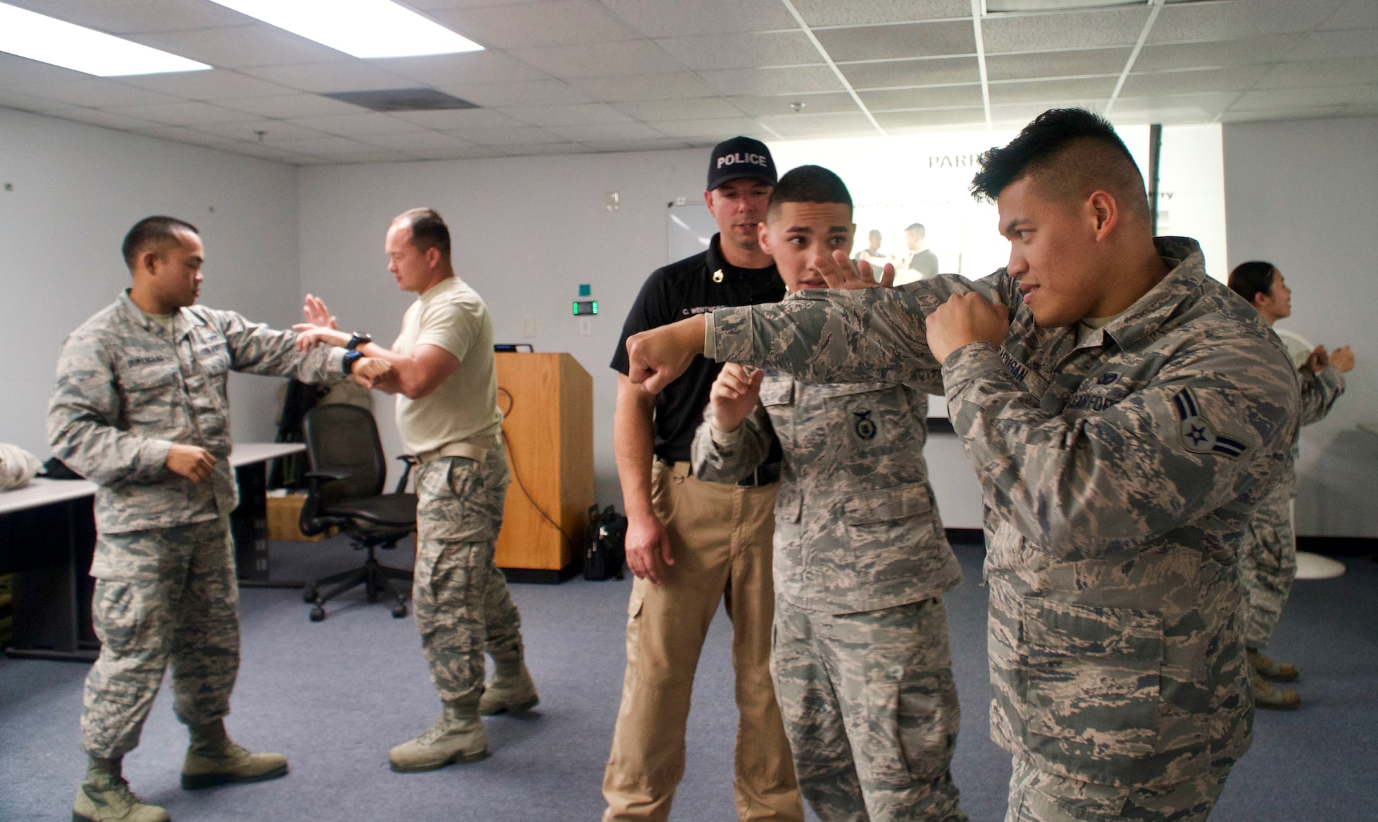 Members from the 154th Security Forces Squadron practice combative techniques under the guidance of Police Staff Sergeant Chuck Wentworth, resource protection specialist, Feb. 10, 2018, at Gulfport Combat Readiness Training Center, Mississippi.