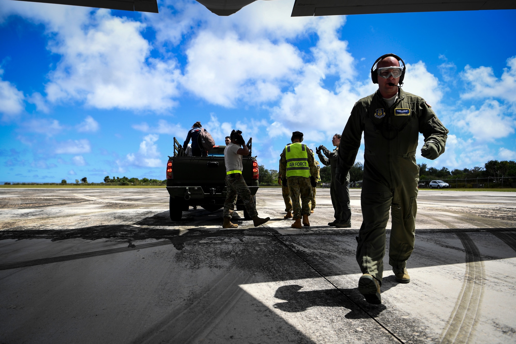 U.S. Air Force Master Sgt. Ryan McClellan, 36th Aeromedical Evacuation Squadron technician, boards a U.S. Air Force C-130J Super Hercules during an aeromedical mission at Rota, U.S. Commonwealth of the Northern Mariana Islands, during exercise COPE NORTH 18, Feb. 19.
