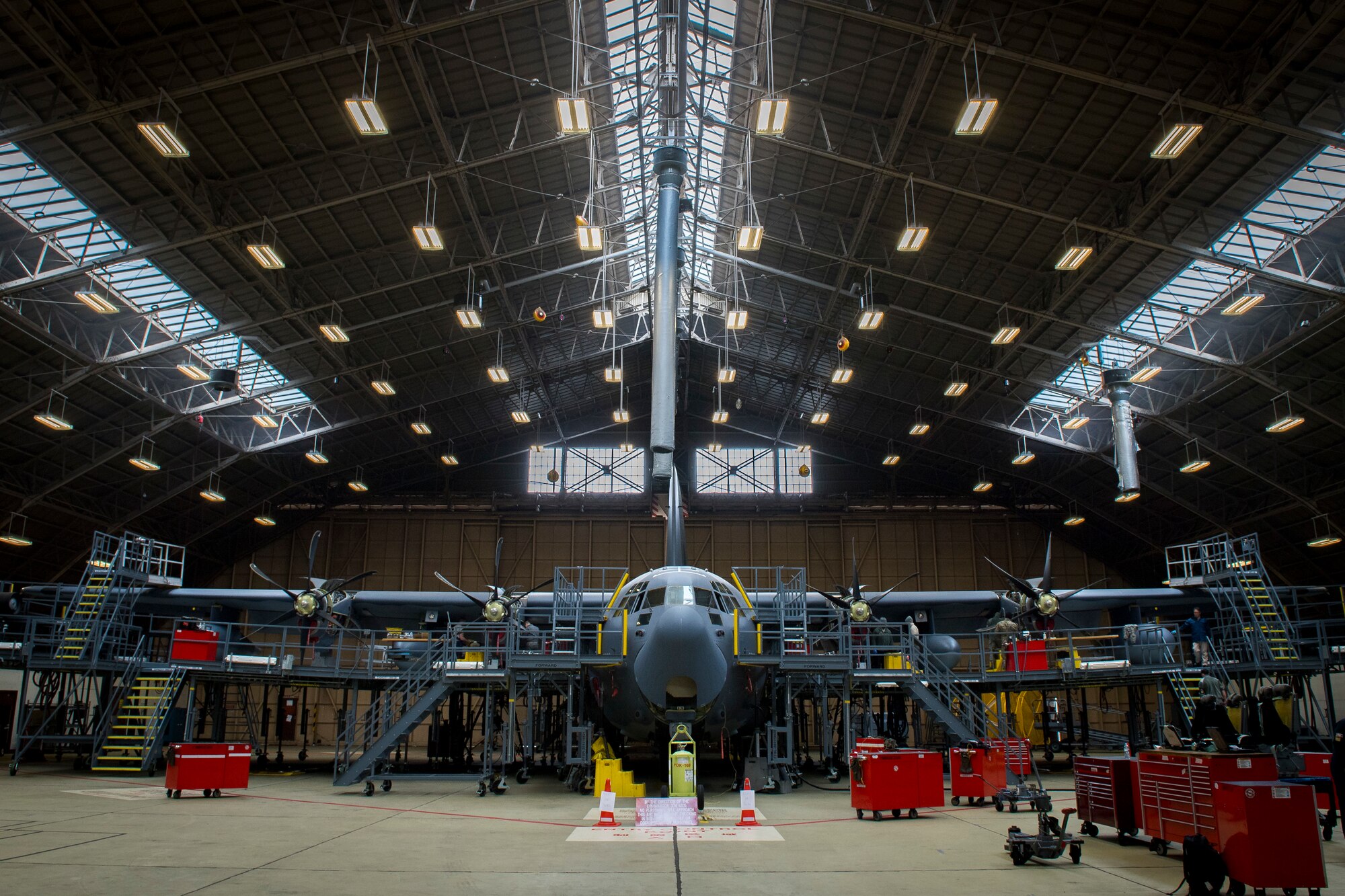 A C-130J Super Hercules is inspected by Airmen from the 374th Maintenance Squadron, Feb. 22, 2018, at Yokota Air Base, Japan.