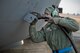 Airman 1st Class James Pettitt, 374th Aircraft Maintenance Squadron crew chief, connects an aircraft generator