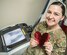 Senior Airman Katie Bryan, X-Ray Technician at Al Dhafra Air Base deployed from Wright-Patterson Air Force Base, poses for a Valentine’s Day photo illustration with her medical equipment on Feb. 13, 2018.  (U.S. Air National Guard Photo Illustration by Tech Sgt Lynette Hoke)