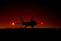 An U.S. Air Force F-22 Raptor assigned to the 380th Air Expeditionary Wing,  Al Dhafra Air Base, United Arab Emirates prepares to taxi down the runway in  support of Operation Inherent Reslove, Feb. 13, 2018. The Raptor is a critical component of the Global Strike Task Force and is designed to
 project air dominance, rapidly and at great distances and defeat threats  attempting to deny access to our nation's Air force, Army, Navy and Marine Corps. (U.S. Air Force photo by Tech. Sgt. Anthony Nelson Jr.)