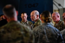 U.S. Air Force Gen. Mike Holmes, commander of Air Combat Command and Chief Master Sgt. Frank Batten, command chief of Air Combat Command talk with  Airmen assigned to the 380th Expeditionary Aircraft Maintenance Squadron,  Feb. 11, 2018, on Al Dhafra Air Base, UAE. Holmes and Batten visited Airmen
 who are currently deployed to the Middle East in support of Operation Inherent Resolve.
 (U.S. Air Force photo by Tech. Sgt. Anthony Nelson J.R.)