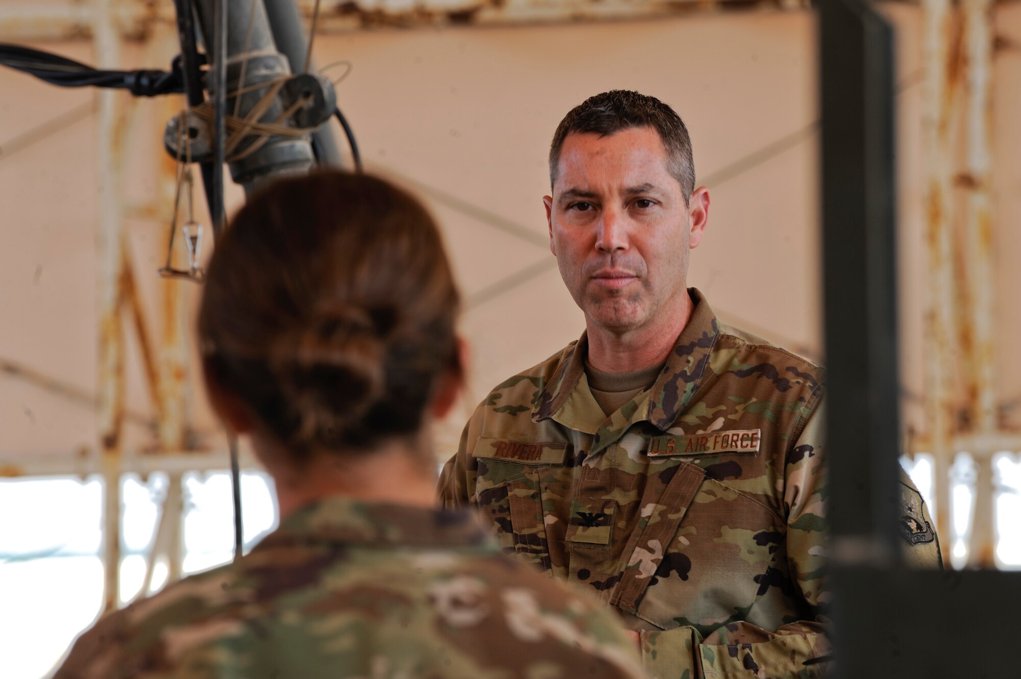U.S. Air Force Col. Eric Rivera, U.S. Air Forces Central Command air reserve component advisor, speaks to Airmen at the ammunition compound on Al Dhafra Air Base, United Arab Emirates, Feb. 7, 2018. Directed by AFCENT in support of United States Central Command, the 380th Air Expeditionary Wing delivers decisive air, space, and cyberspace capabilities throughout the region. (U.S. Air Force photo by Airman 1st Class D. Blake Browning)