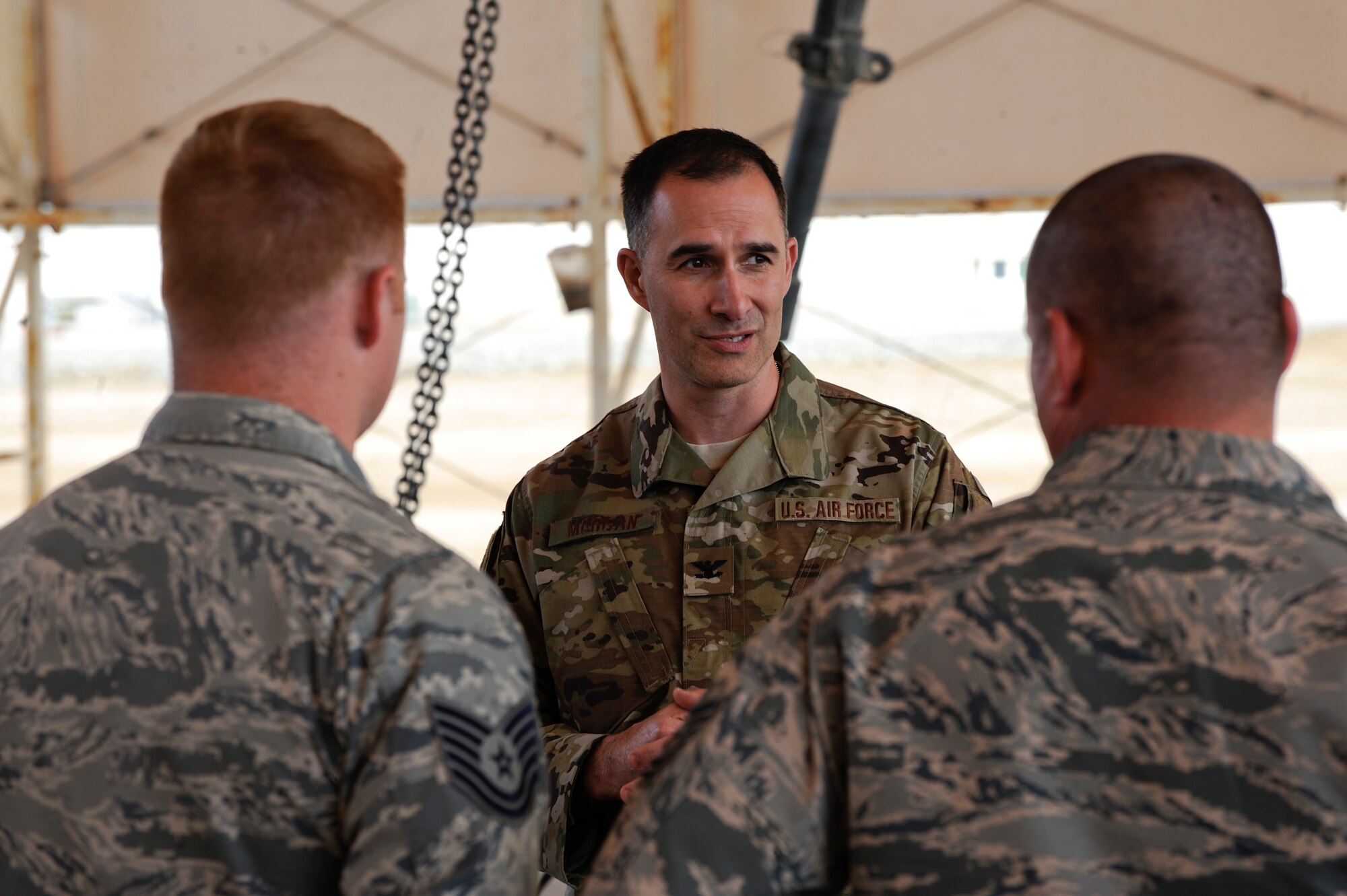 U.S. Air Force Col. Troy Morgan, U.S. Air Forces Central Command deputy air reserve component advisor, speaks to Airmen at the ammunition compound on Al Dhafra Air Base, United Arab Emirates, Feb. 7, 2018. Directed by AFCENT in support of United States Central Command, the 380th Air Expeditionary Wing delivers decisive air, space, and cyberspace capabilities throughout the region. (U.S. Air Force photo by Airman 1st Class D. Blake Browning)