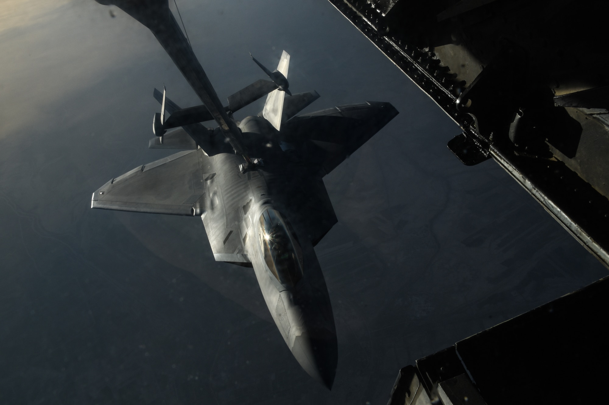 An U.S Air Force F-22 Raptor receives fuel from a KC-10 Extender during a mission in support of Operation Inherent Resolve over Iraq, Feb. 2, 2018. The F-22 performs both air-to-air and air-to-ground missions. (U.S. Air National Guard photo by Staff Sgt. Colton Elliott)