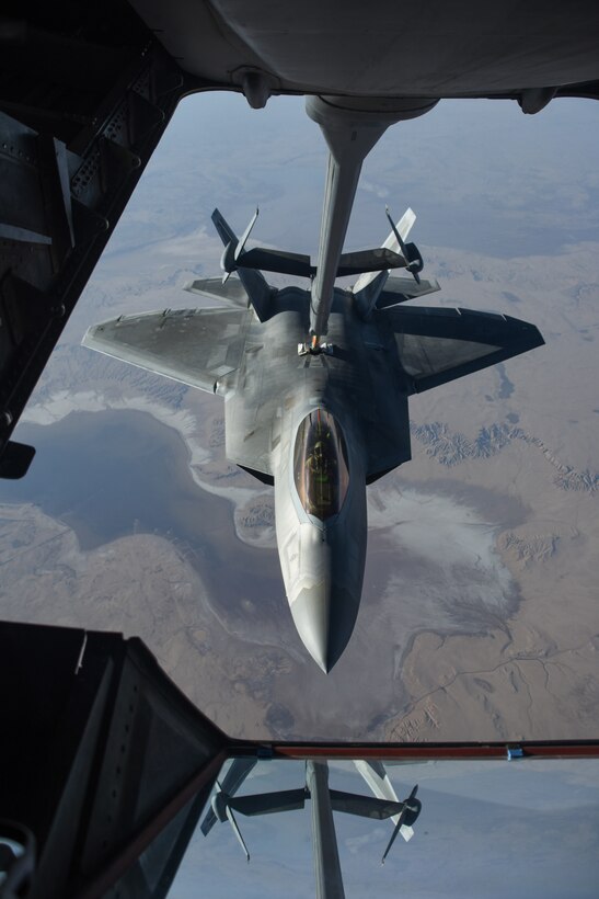 An U.S Air Force F-22 Raptor receives fuel from a KC-10 Extender during a mission in support of Operation Inherent Resolve over Syria, Feb. 2, 2018. The F-22 is a component of the Global Strike Task Force, supporting U.S. and Coalition forces working to liberate territory and people under the control of ISIS. (U.S. Air National Guard photo by Staff Sgt. Colton Elliott)