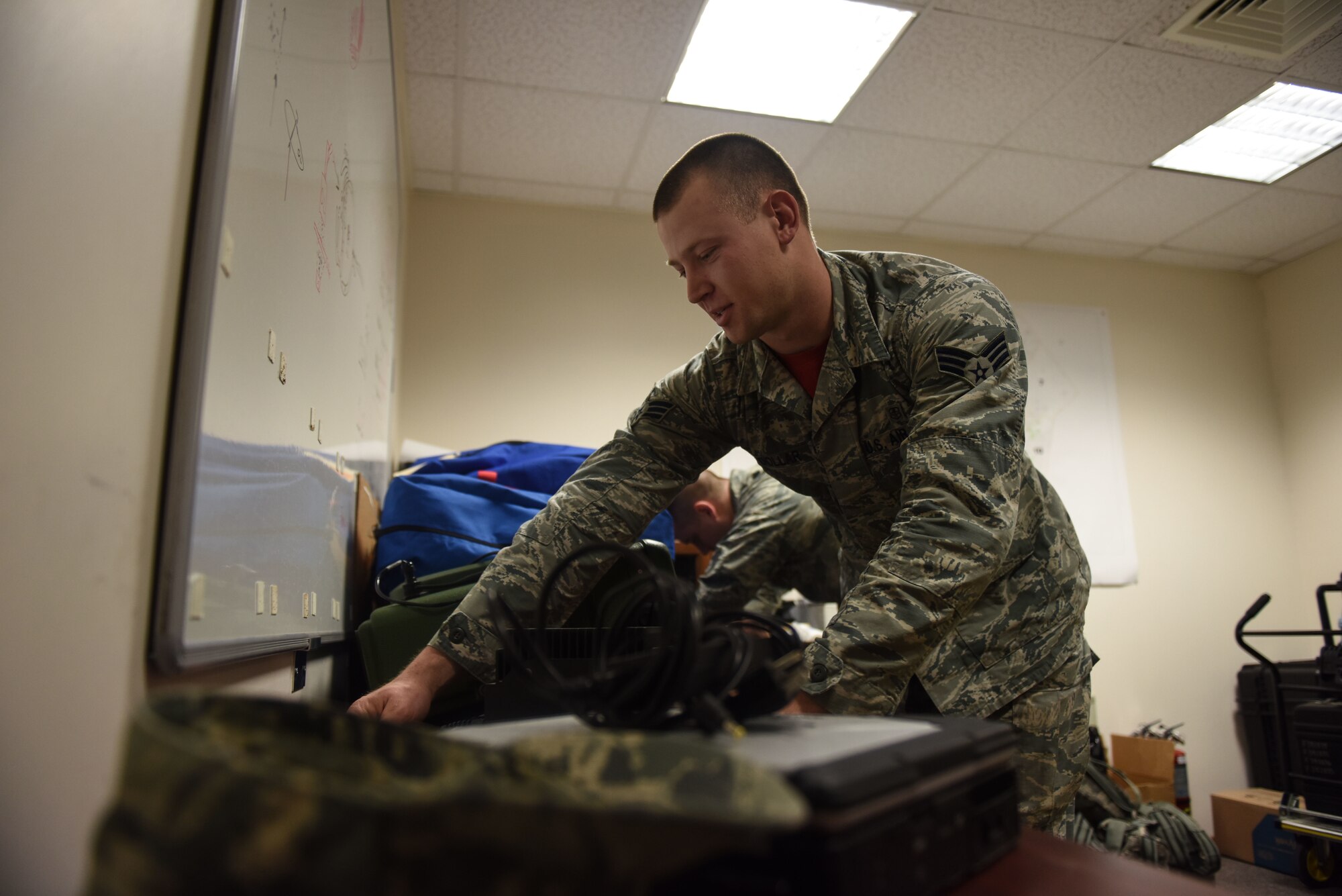 U.S. Air Force Senior Airman Gannon Dollar, 39th Medical Operations Squadron biomedical technician, prepares a hazardous air pollutants on-site system during a contingency medical exercise at Incirlik Air Base, Turkey, Feb. 16, 2018. The HAPSITE was used during the exercise to provide on-scene identification of toxic industrial chemicals and chemical warfare agents, and monitor toxicity levels in the air to prevent contamination. (U.S. Air Force photo by Senior Airman Kristan Campbell)