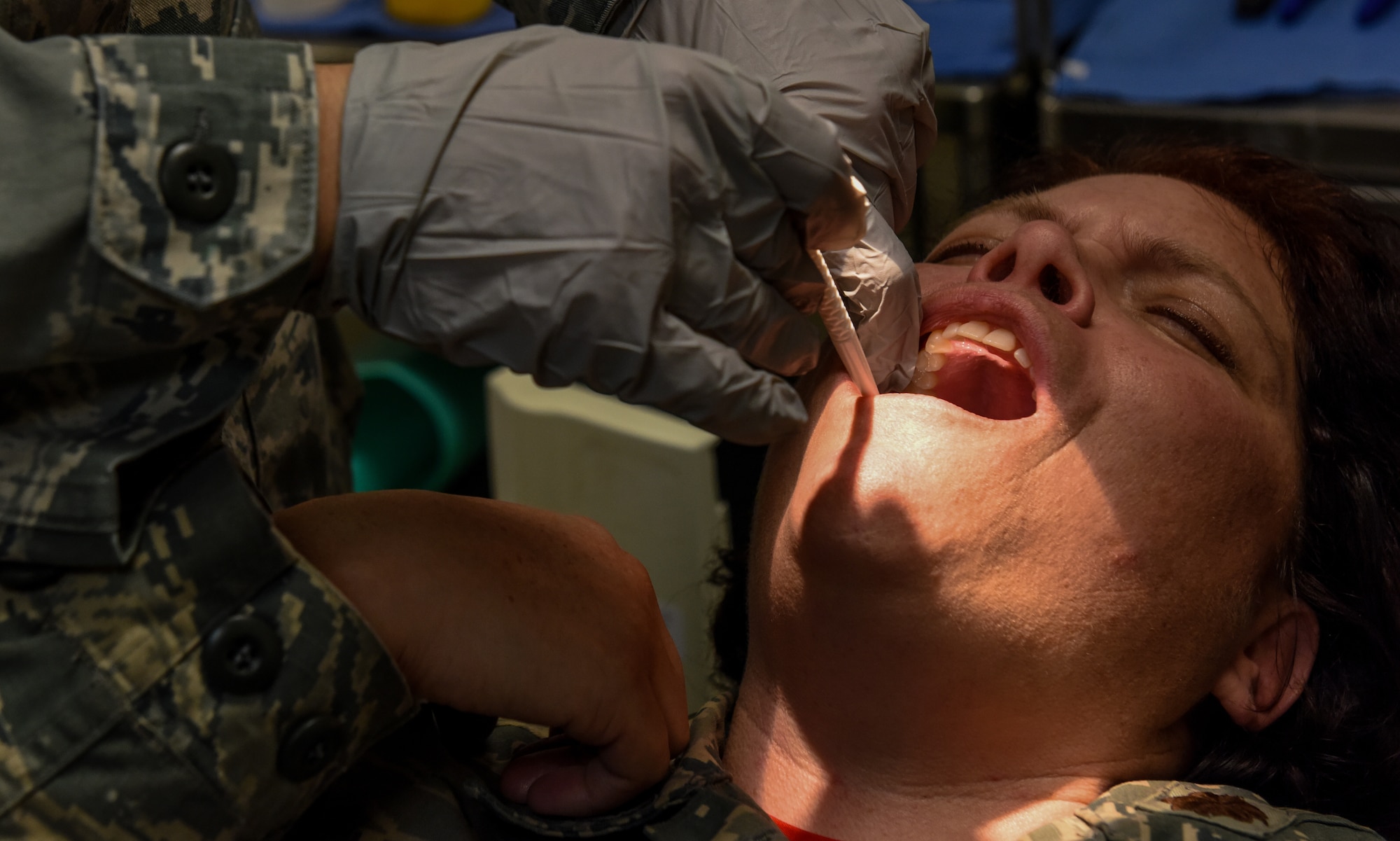 U.S. Air Force Maj. Mary Gaines, 39th Medical Group clinical nurse disease manager, acts as a patient while participating in a contingency medical exercise at Incirlik Air Base, Turkey, Feb. 16, 2018. During the exercise, the service members of the 39 MDG set-up and efficiently treated patients from a secondary facility, in the event that a real-world situation effected the medical treatment facility, deeming it inoperable. (U.S. Air Force photo by Airman 1st Class Octavius
Thompson)