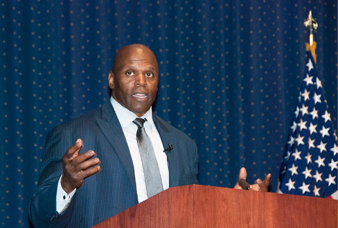 Ken Harvey, former NFL linebacker, describes the sacrifices made by African Americans in the military during a Black History Month observance at the McNamara Headquarters Complex Feb. 21.