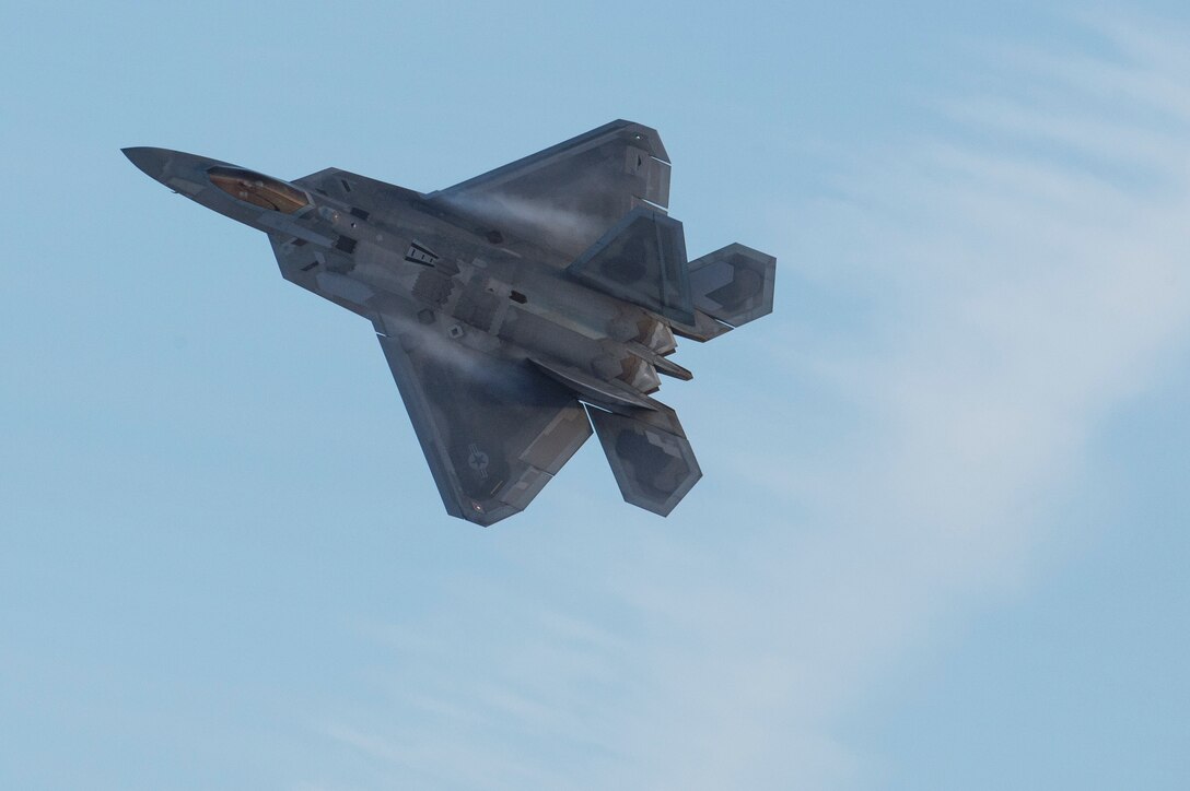 An F-22 Raptor assigned to the 3rd Wing flies over Joint Base Elmendorf-Richardson, Alaska, Feb. 13, 2018. The F-22 is the Air Force’s premium fifth-generation fighter asset.