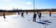 Members of Team Whiteman participate in the first extramural hockey practice at Whiteman Air Force Base, Mo., Feb. 17, 2018. The old skate park outside the fitness center provides the teams enough space to practice techniques and play games. (U.S. Air Force photo by Staff Sgt. Danielle Quilla)
